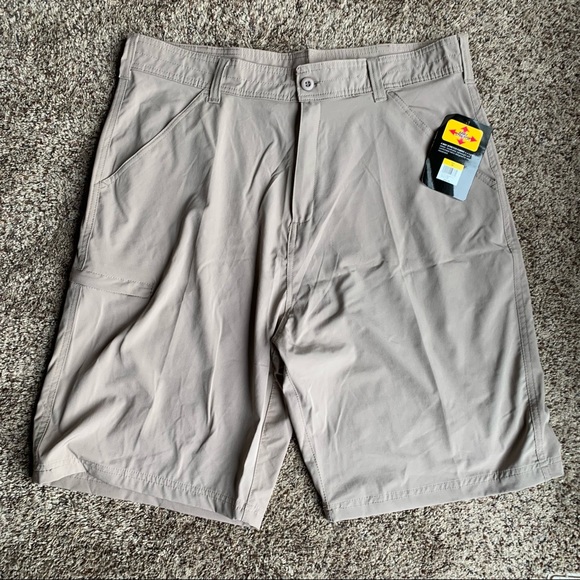 NWT DC Performance Casual Tan shorts. Size 38 - Picture 1 of 5